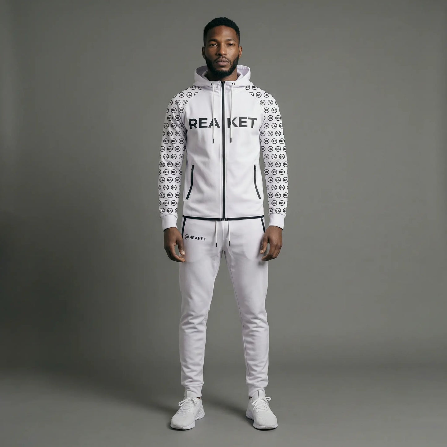 Ensemble Jogging Adzopé Zippé unisexe Reaket, une marque de vêtements de sport