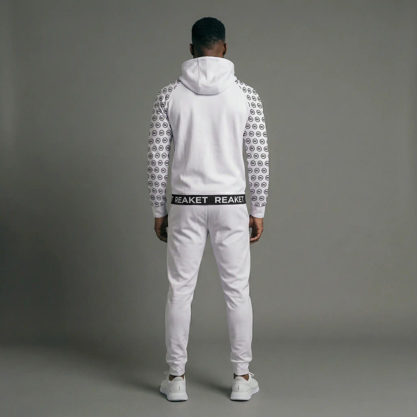 Ensemble Jogging Adzopé Zippé unisexe Reaket, une marque de vêtements de sport