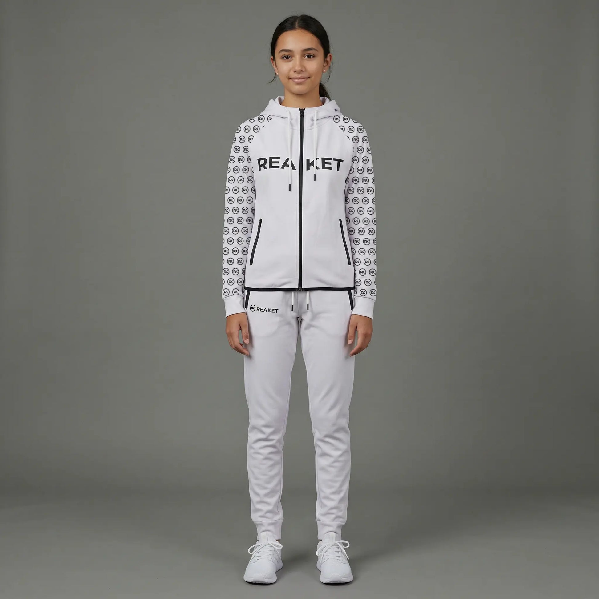 Ensemble Jogging Adzopé Zippé unisexe Reaket, une marque de vêtements de sport