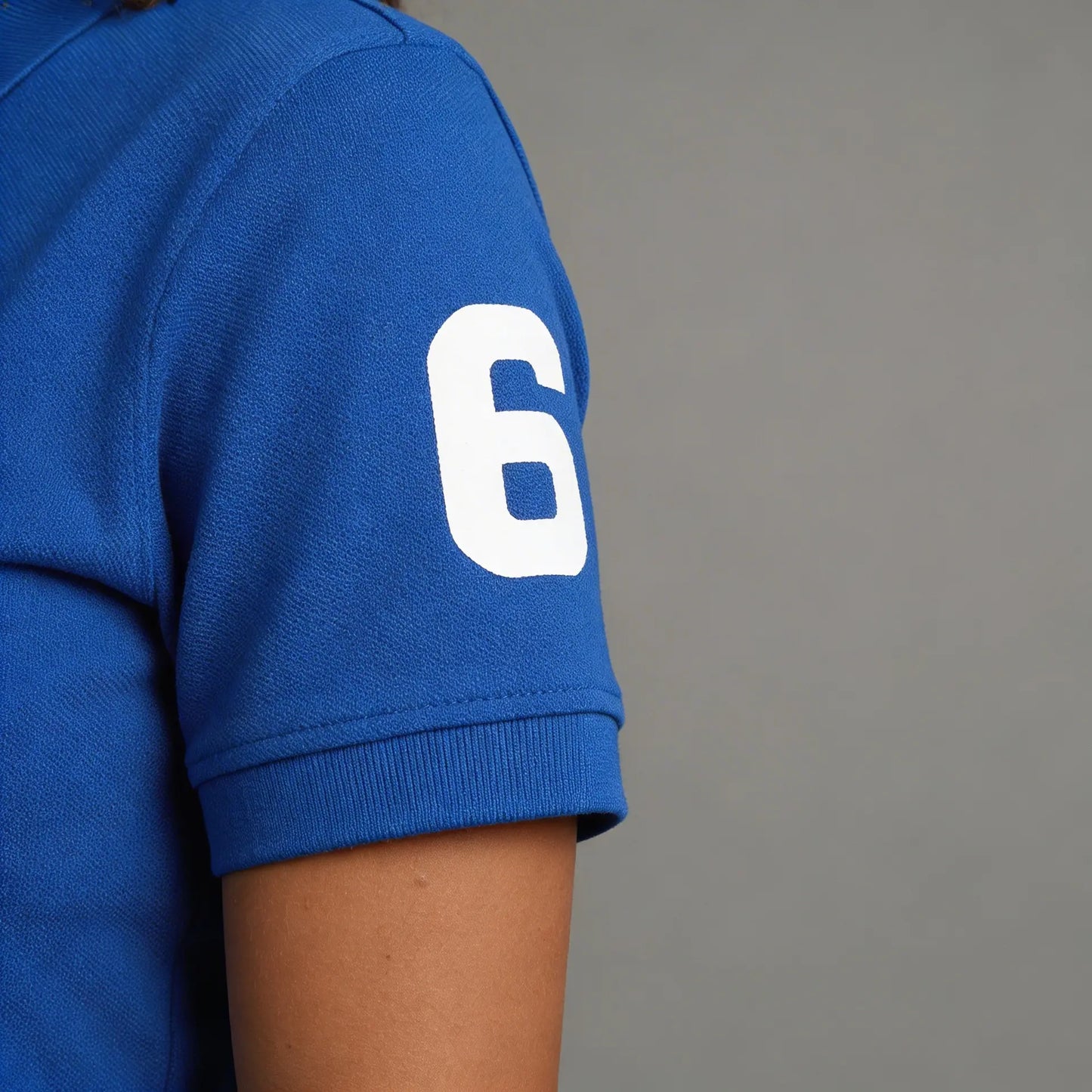 Polo Reaket Taï Unisexe Reaket, une marque de vêtements de sport