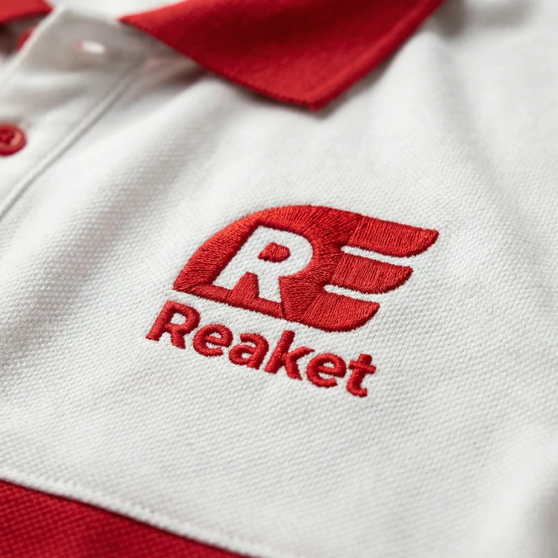 Polo Reaket win win Unisexe Reaket, une marque de vêtements de sport