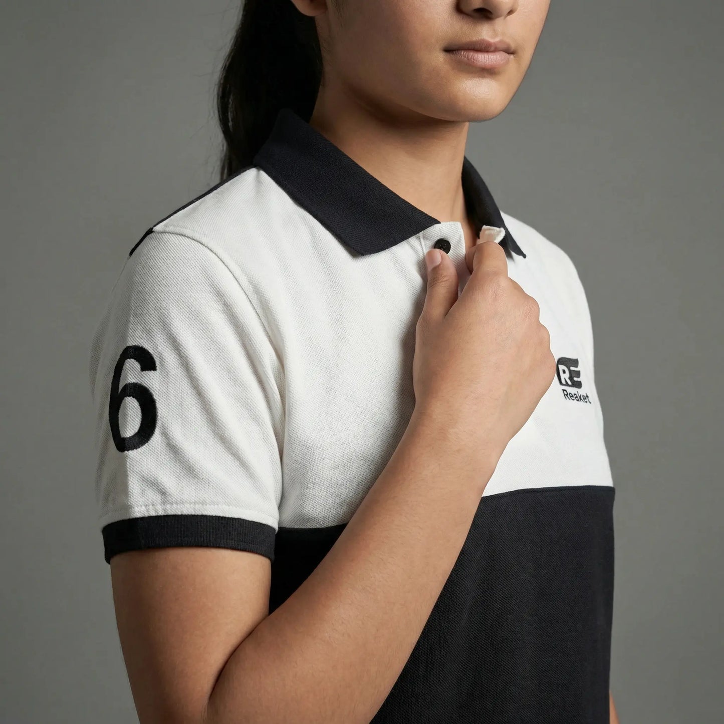 Polo Reaket win win Unisexe Reaket, une marque de vêtements de sport