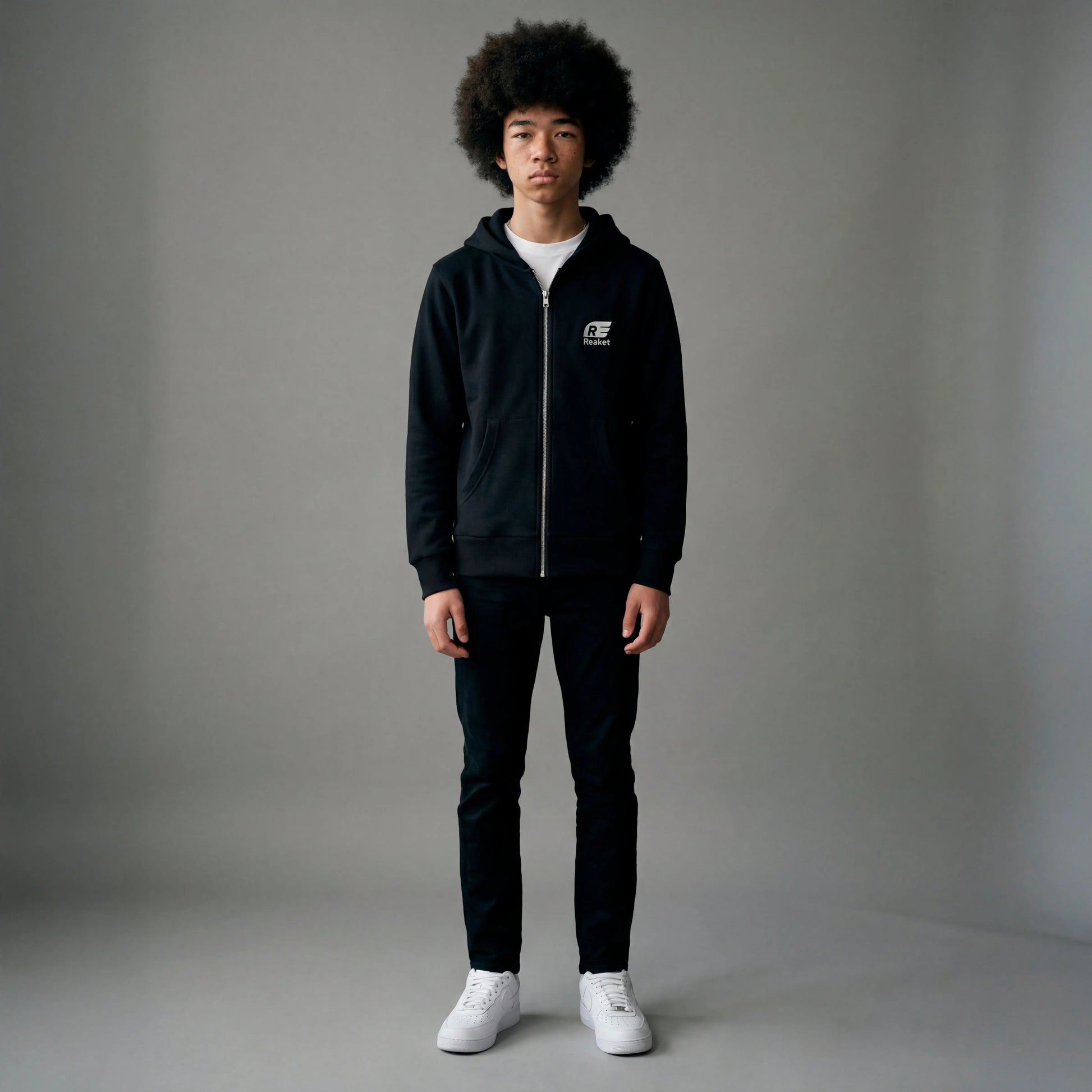 Sweat Séguéla Zip enfant Reaket, une marque de vêtements de sport