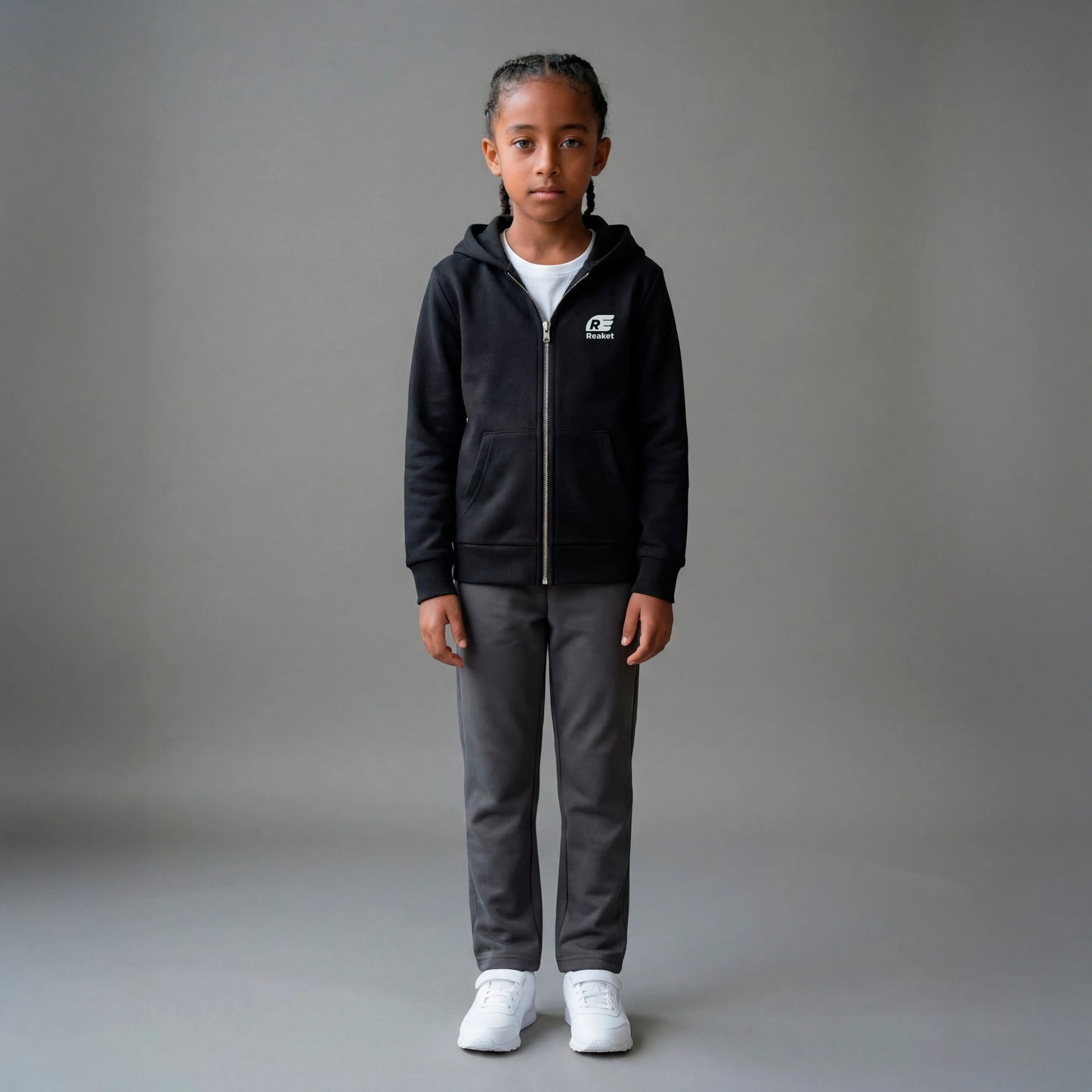 Sweat Séguéla Zip enfant Reaket, une marque de vêtements de sport