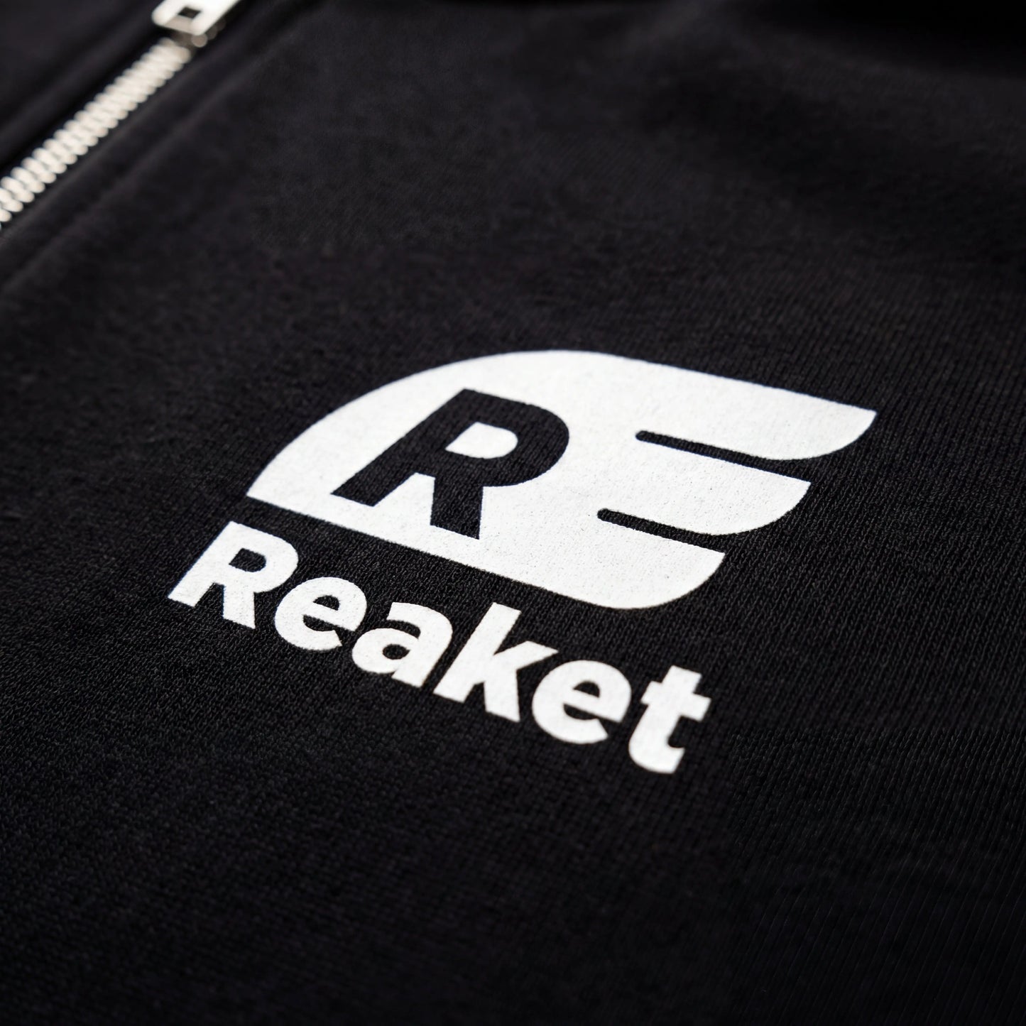 Sweat Séguéla Zip enfant Reaket, une marque de vêtements de sport