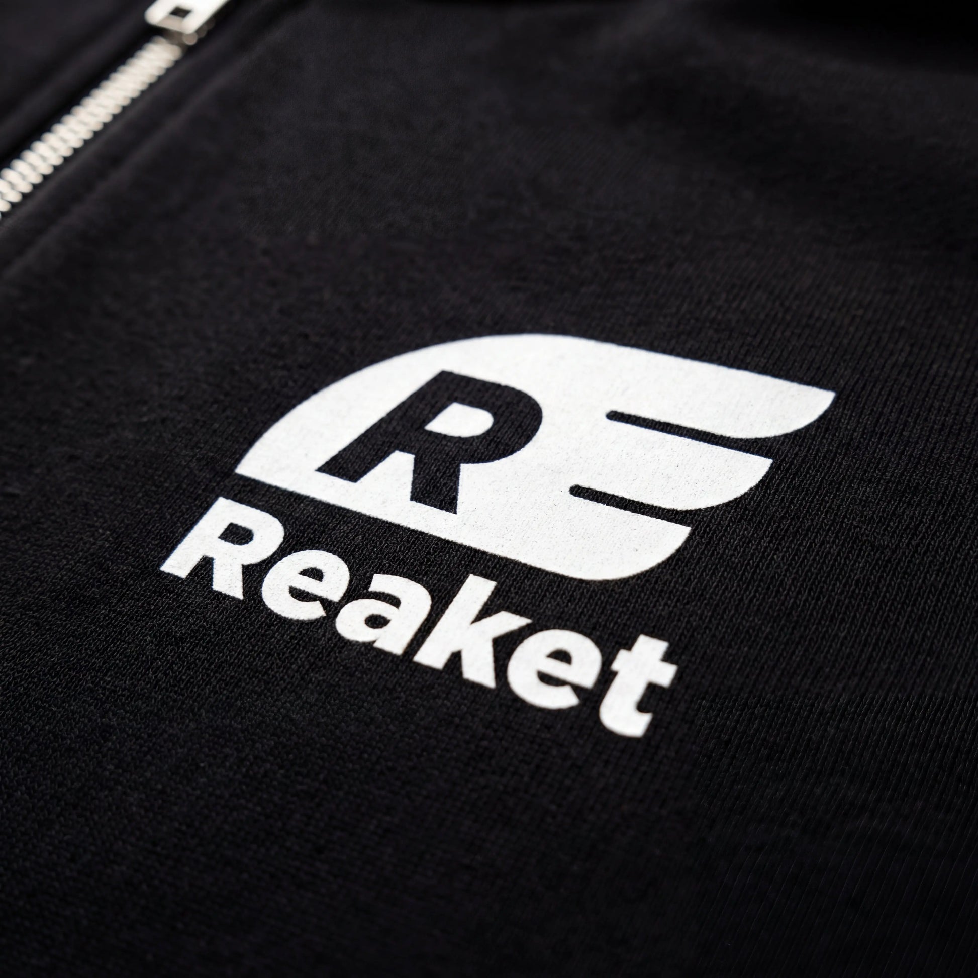 Sweat Séguéla Zip enfant Reaket, une marque de vêtements de sport