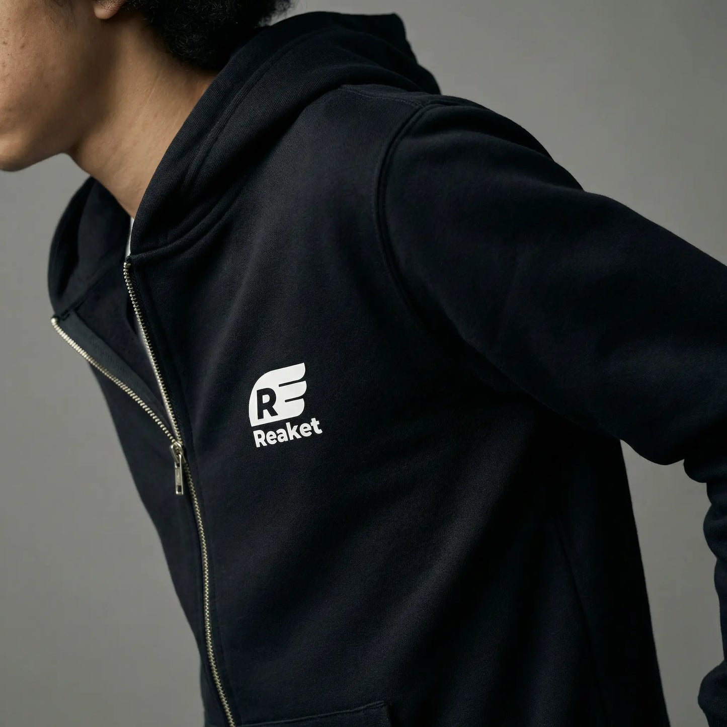 Sweat Séguéla Zip enfant Reaket, une marque de vêtements de sport