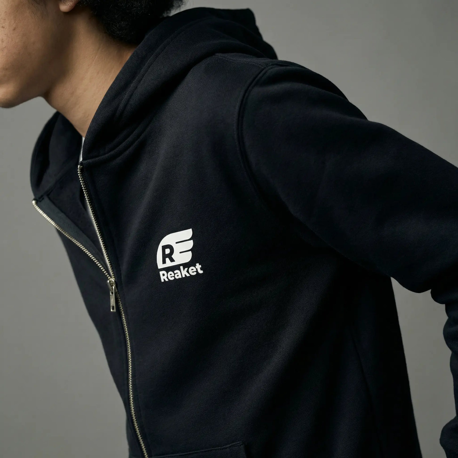 Sweat Séguéla Zip enfant Reaket, une marque de vêtements de sport