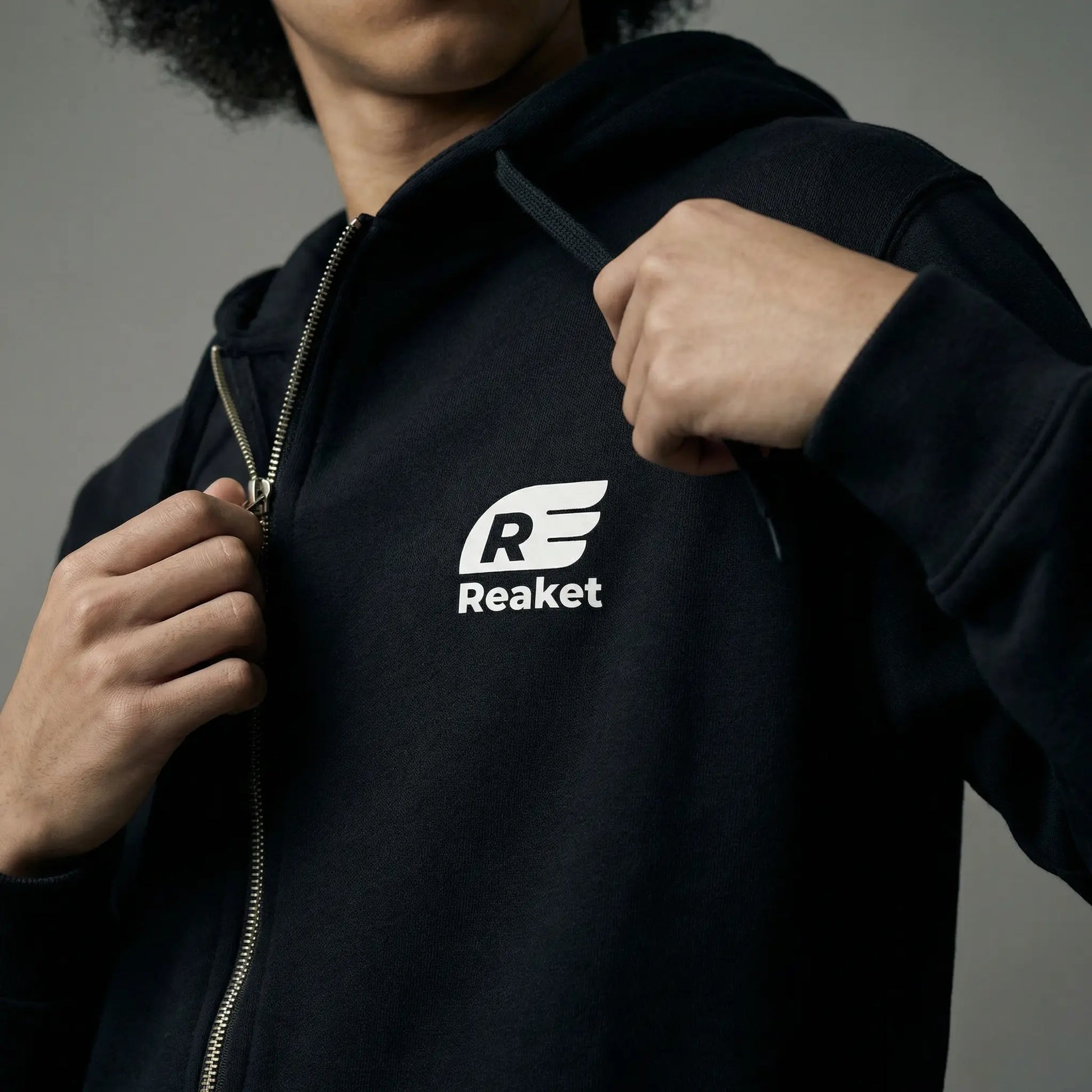 Sweat Séguéla Zip enfant Reaket, une marque de vêtements de sport